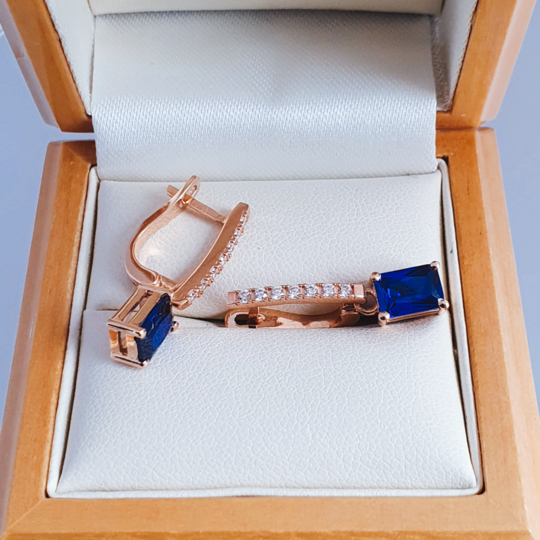 Earrings with dar blue topaz