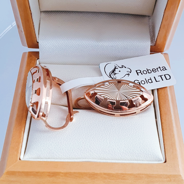 Golden earrings covered white gold