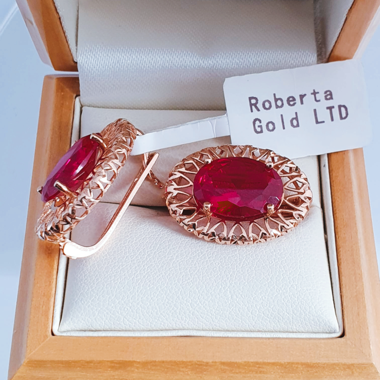 Earrings with big red stones from zirconia