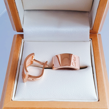 Cartier sign earrings