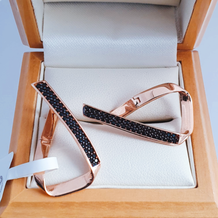 Gold earrings with black zirconia stones