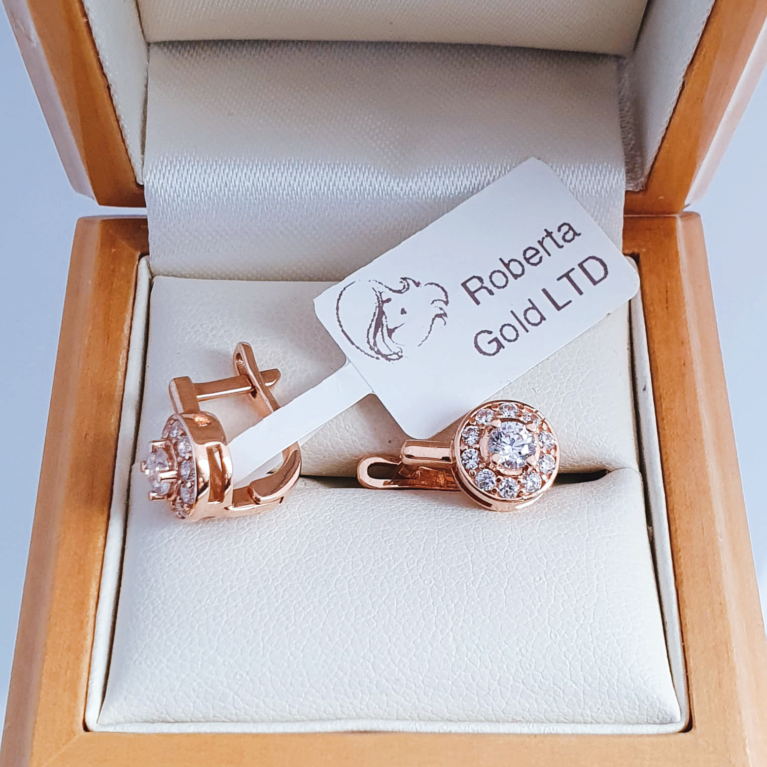 Golden earrings with zirconia