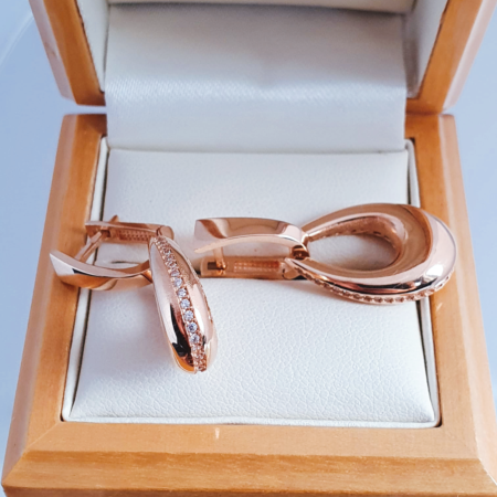 Golden earrings with white zirconia