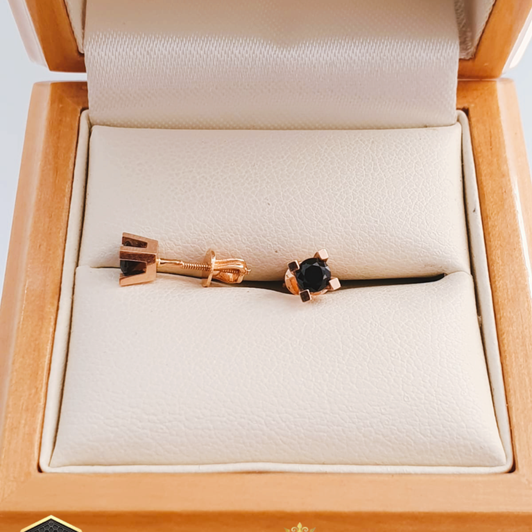 Golden Stud earrings with black zirconia stones
