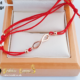Red capron bracelet